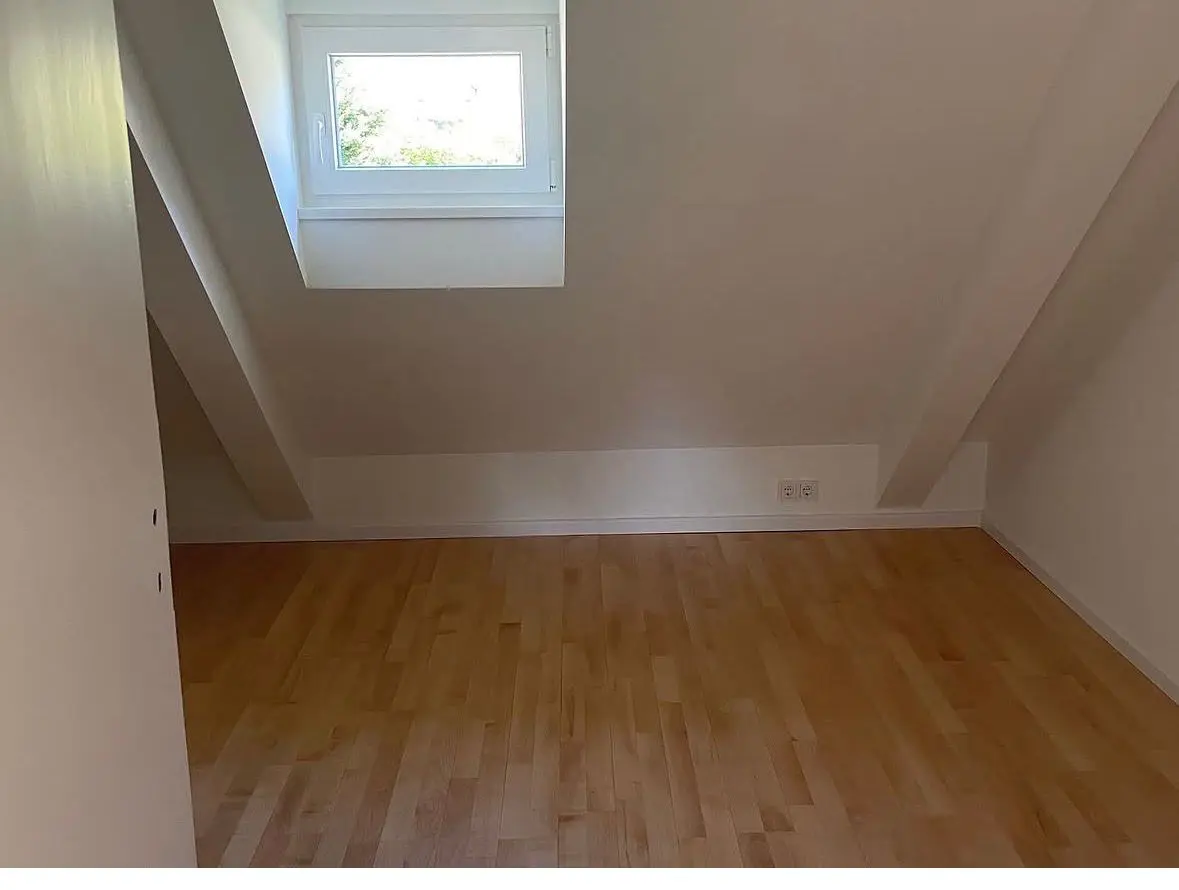 Loft room with a new wood floor