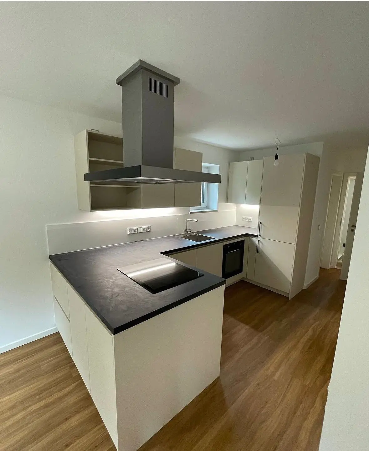 New kitchen with an island after the apartment refurbishment